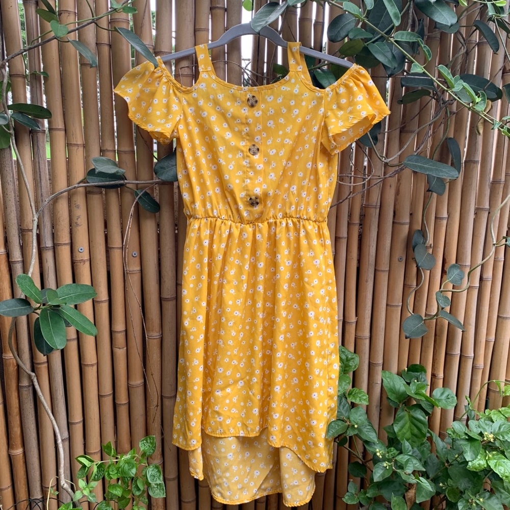 Yellow girls dress with white flowers